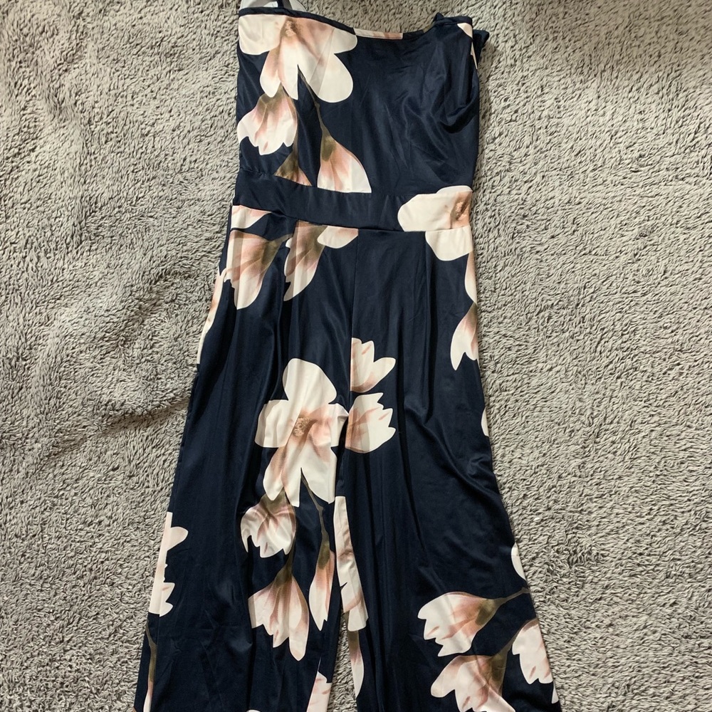navy and pink flowered jumpsuit